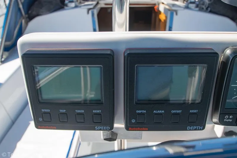 Slide: The Image of Digital navigation instruments on a 1997 Catalina 320 MkII sailboat dashboard. - 29