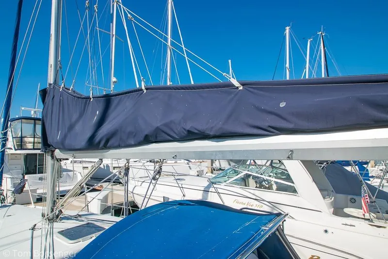 Slide: The Image of Sailboat Catalina 320 MkII, 1997 model, docked with blue sail cover. - 36
