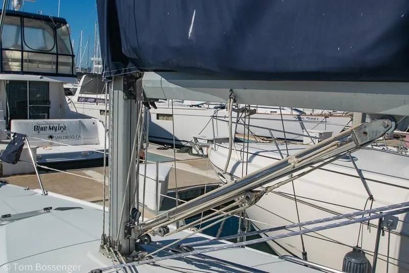 Slide: The Image of Catalina 320 MkII sailboat, 1997 model, docked in a marina with other boats. - 37