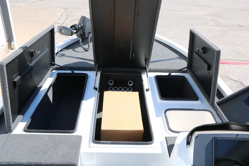 Slide: The Image of 2025 Vexus AVX 2080 boat storage compartments open, showcasing interior space. - 23
