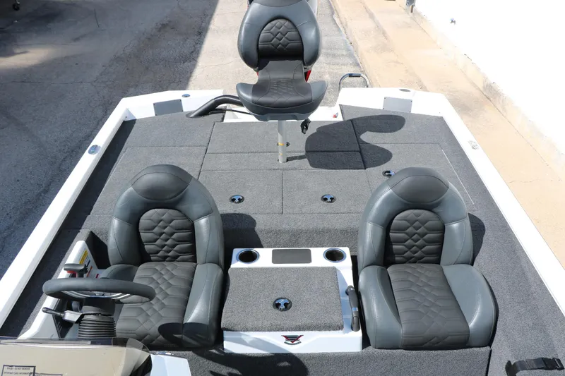 Slide: The Image of 2025 Vexus AVX 2080 boat interior with three cushioned seats and carpeted deck. - 24