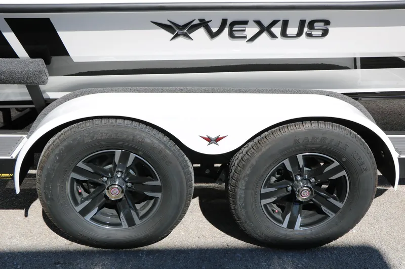 Slide: The Image of 2025 Vexus AVX 2080 boat trailer with black wheels and logo detail. - 28