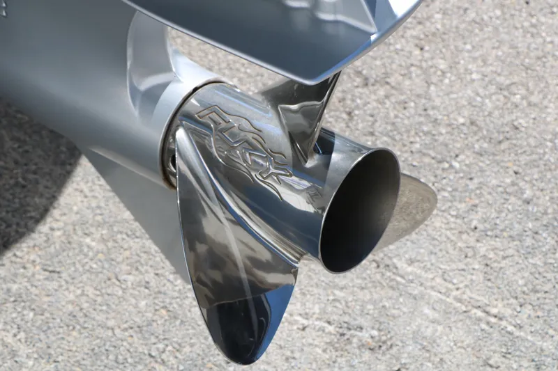 Slide: The Image of Close-up of a 2025 Vexus AVX 2080 boat propeller on a textured surface. - 5