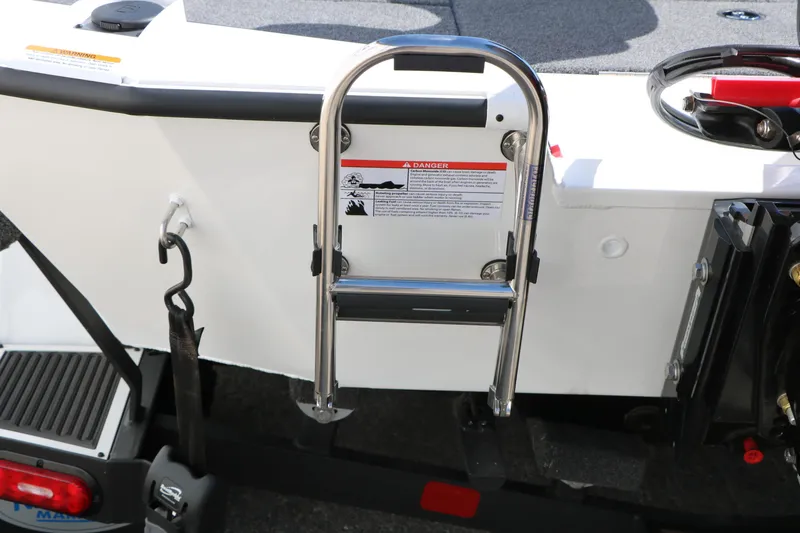 Slide: The Image of 2025 Vexus AVX 2080 boat ladder and safety warning label. - 6