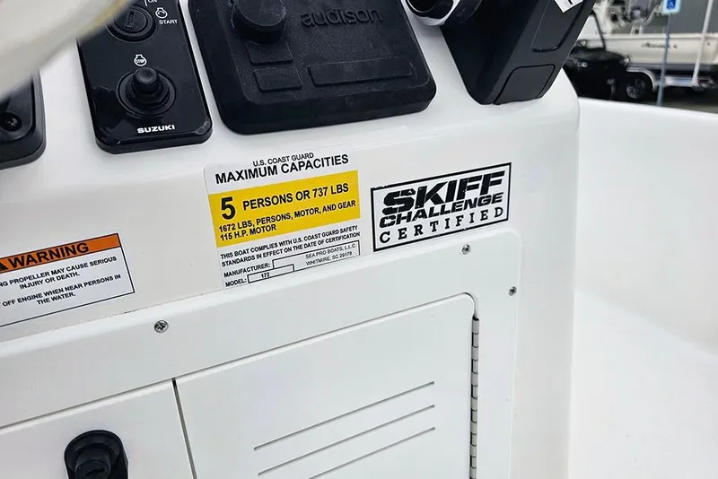 Slide: The Image of Control panel of 2026 Sea Pro 172 Bay boat with capacity and certification labels. - 14