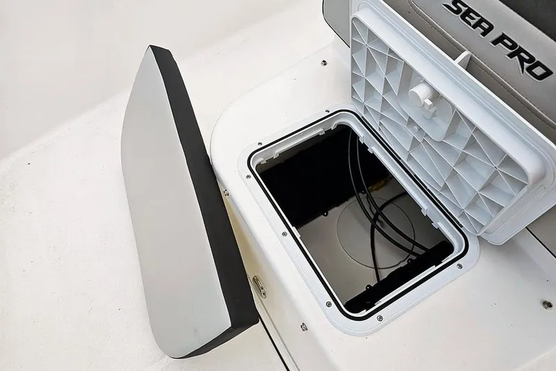 Slide: The Image of 2026 Sea Pro 172 Bay boat storage compartment with open hatch, showcasing interior space. - 17