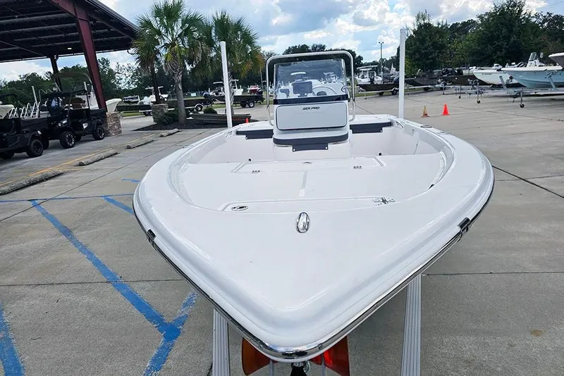 Slide: The Image of 2026 Sea Pro 172 Bay boat displayed outdoors, showcasing sleek design and spacious deck. - 4