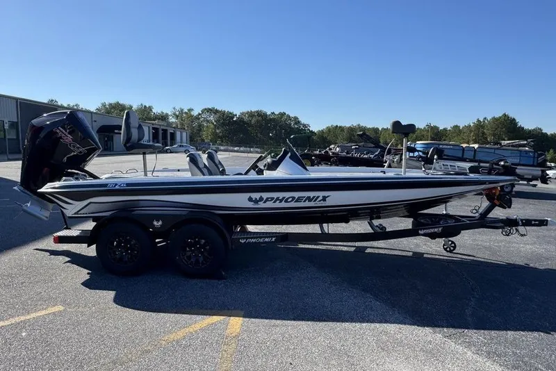 Slide: The Image of 2026 Phoenix 721 ZXL boat on trailer in parking lot, sunny day. - 10