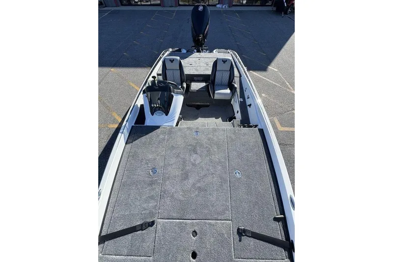 Slide: The Image of 2026 Phoenix 721 ZXL boat interior with seating and carpeted deck. - 13