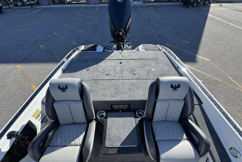 Slide: The Image of 2026 Phoenix 721 ZXL boat interior with two cushioned seats and storage compartments. - 16