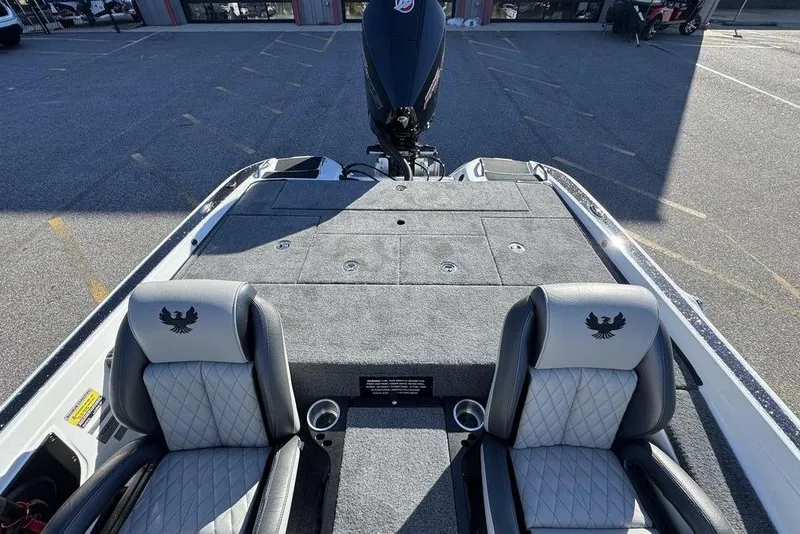 Slide: The Image of 2026 Phoenix 721 ZXL boat interior with two seats and rear deck view. - 17