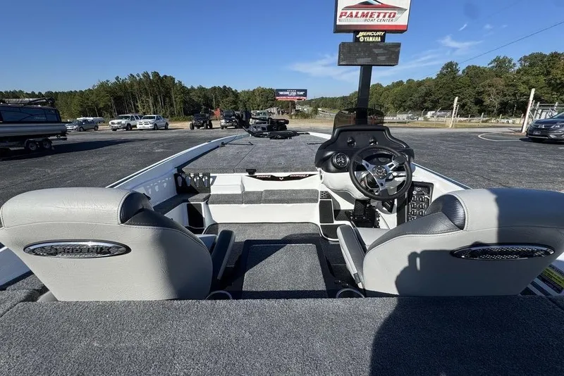Slide: The Image of Interior view of 2026 Phoenix 721 ZXL boat with steering wheel and seats. - 8