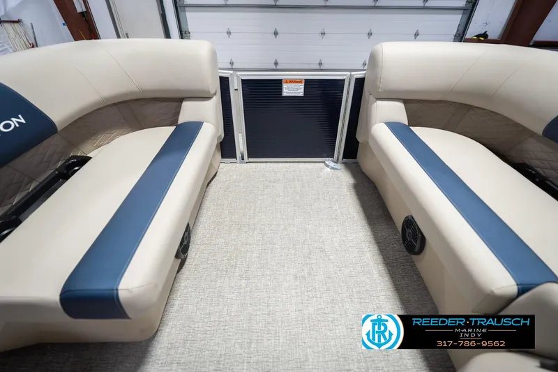 Slide: The Image of Interior of 2026 Bennington 168 SLJ pontoon boat with beige and blue seating. - 21