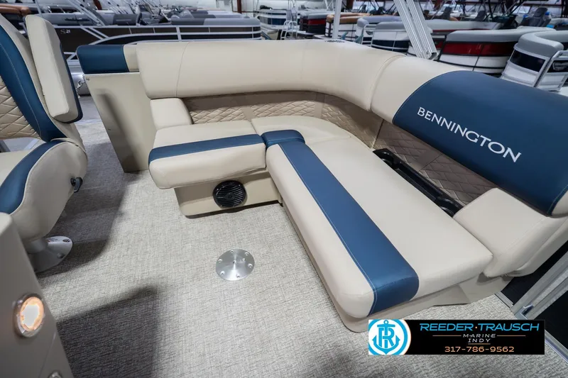 Slide: The Image of Luxurious seating on 2026 Bennington 168 SLJ pontoon boat, featuring elegant blue and beige upholstery. - 24
