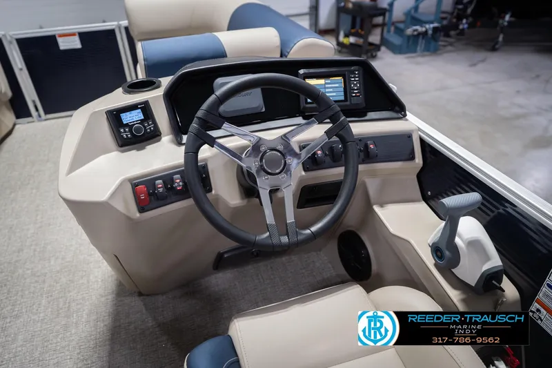 Slide: The Image of 2026 Bennington 168 SLJ boat dashboard with steering wheel and control panel. - 30