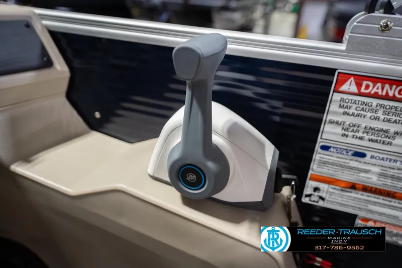 Slide: The Image of Throttle control of 2026 Bennington 168 SLJ boat with safety warning label. - 37