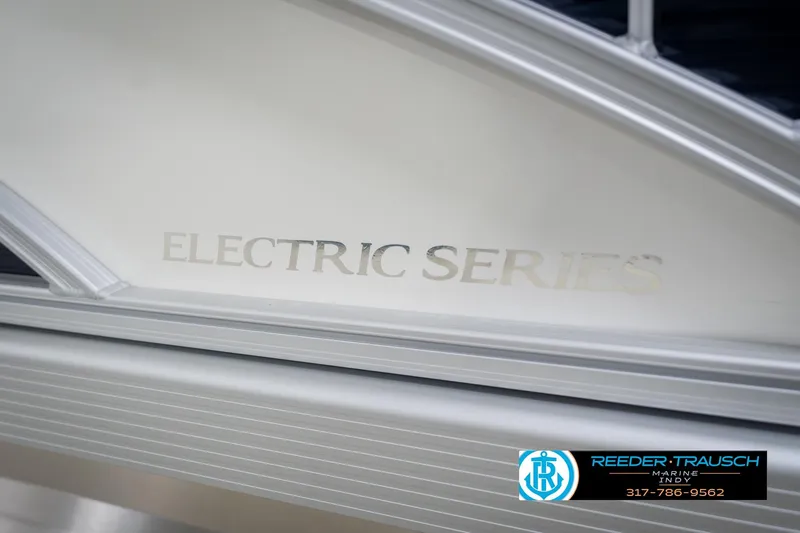 Slide: The Image of 2026 Bennington 168 SLJ Electric Series boat detail with Reeder-Trausch Marine logo. - 48