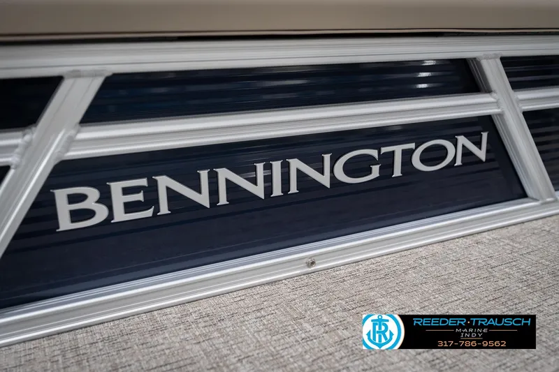 Slide: The Image of 2026 Bennington 168 SLJ boat with logo, displayed at Reeder-Trausch Marine. - 49