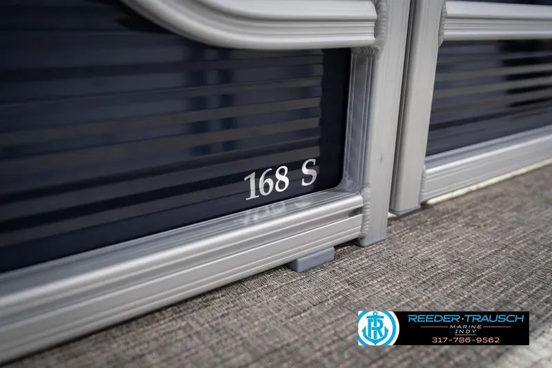 Slide: The Image of 2026 Bennington 168 SLJ boat detail with Reeder-Trausch Marine logo. - 50