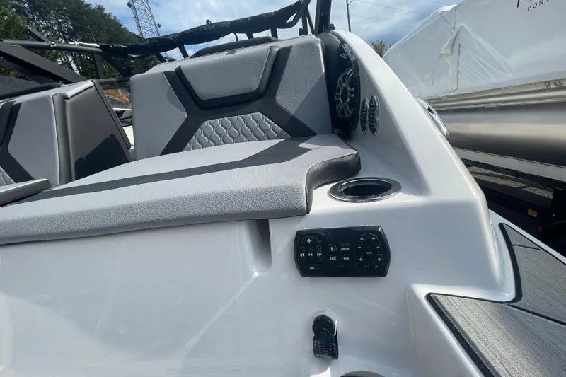 Slide: The Image of 2026 Yamaha Boats 222XD interior with seating, speaker, and control panel. - 12