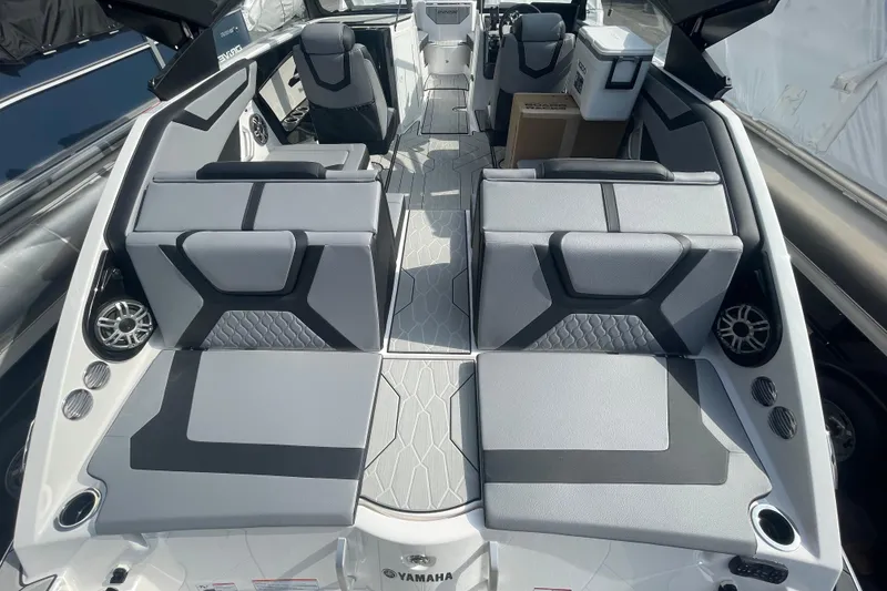 Slide: The Image of 2026 Yamaha Boats 222XD interior with modern seating and sleek design. - 13