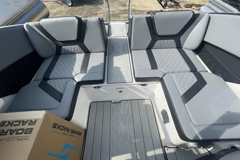 Slide: The Image of 2026 Yamaha Boats 222XD interior with stylish seating and modern design. - 16