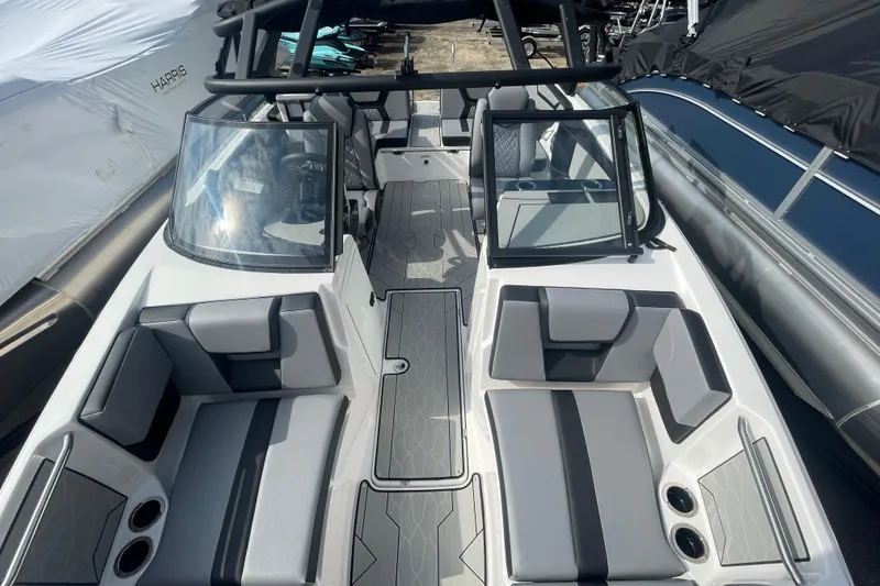Slide: The Image of 2026 Yamaha Boats 222XD interior, featuring sleek seating and modern design elements. - 22