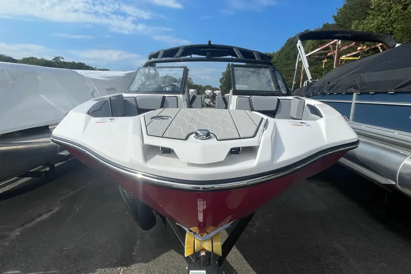 Slide: The Image of 2026 Yamaha Boats 222XD, sleek design, docked outdoors, clear sky background. - 3