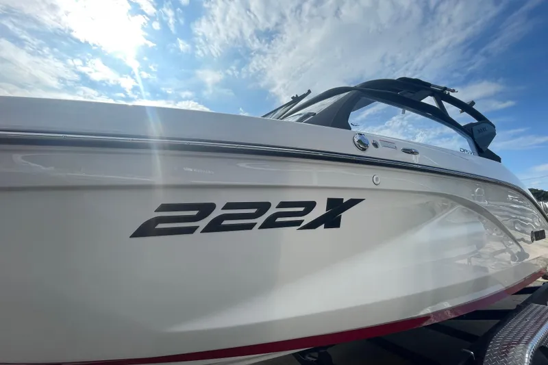 Slide: The Image of 2026 Yamaha Boats 222XD, sleek design under a bright blue sky. - 4