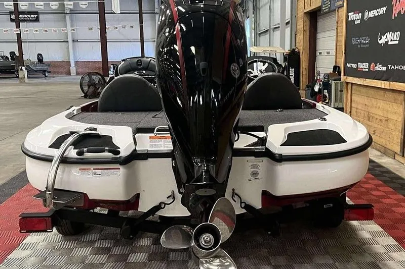 Slide: The Image of 2026 Nitro Z17 boat with powerful outboard motor in showroom. - 4