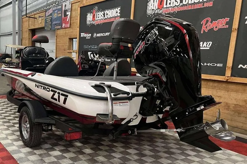 Slide: The Image of 2026 Nitro Z17 boat with powerful engine displayed indoors on checkered flooring. - 6