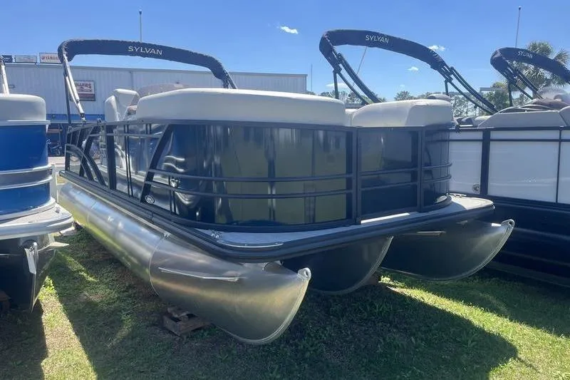 The Image of 2025 Sylvan Mirage 820 CLZ DH pontoon boat displayed outdoors. - 0