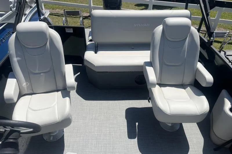 Slide: The Image of Interior of 2025 Sylvan Mirage 820 CLZ DH boat with plush seating. - 6
