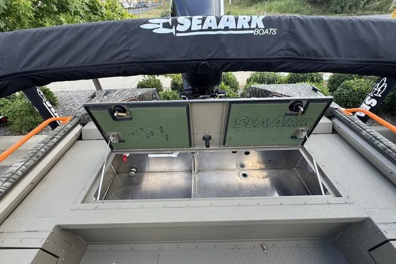 Slide: The Image of 2026 SeaArk EasyCat boat interior with camo seats and control panel. - 11