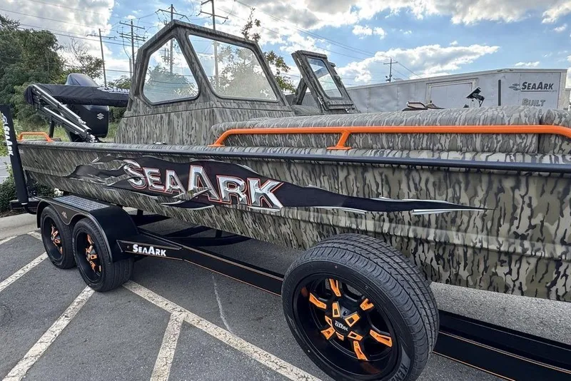 Slide: The Image of 2026 SeaArk EasyCat boat on trailer, featuring a powerful Mercury Pro XS engine. - 4