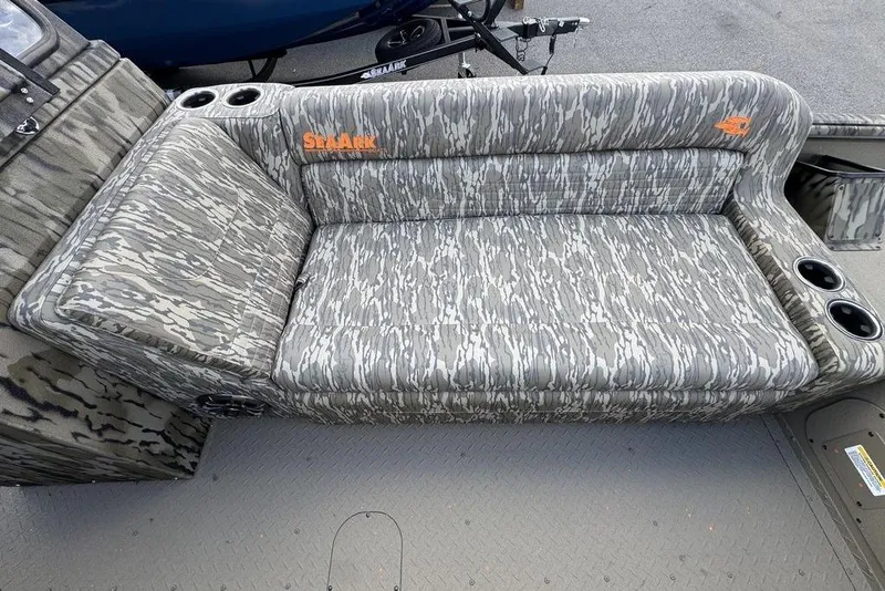 Slide: The Image of 2026 SeaArk EasyCat boat interior with camo seating and spacious layout. - 9