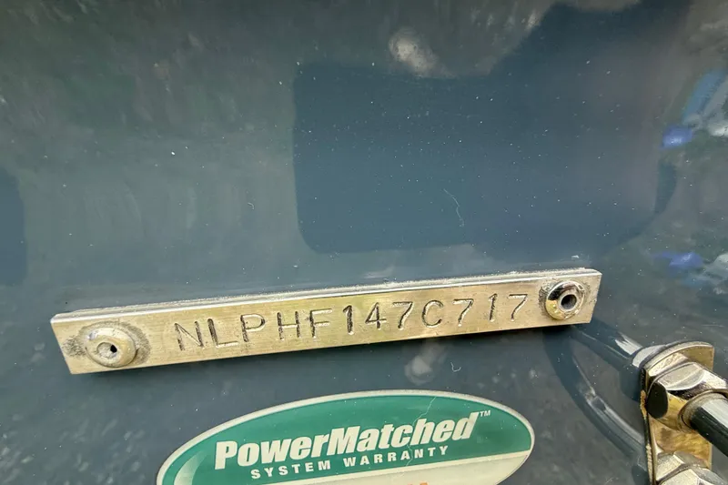 Slide: The Image of 2017 Tidewater 230 LXF boat with serial number and PowerMatched warranty label. - 23