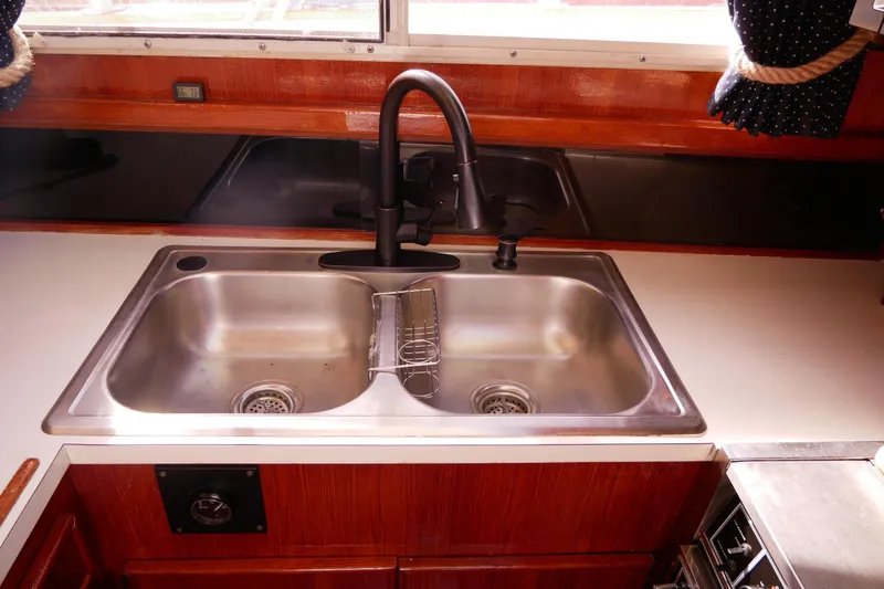Slide: The Image of Stainless steel sink in 1985 Tollycraft 48 Cockpit Motor Yacht kitchen. - 28