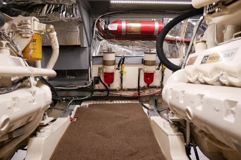 Slide: The Image of Engine room of 1985 Tollycraft 48 Cockpit Motor Yacht with CAT engines and fire suppression system. - 47