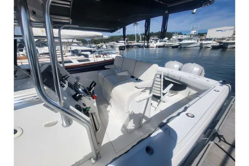 Slide: The Image of 2005 Stamas 310 Tarpon boat interior with seating, docked at marina. - 41