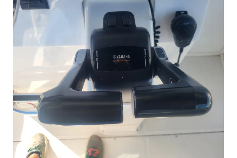 Slide: The Image of Yamaha throttle control on 2005 Stamas 310 Tarpon boat dashboard. - 56