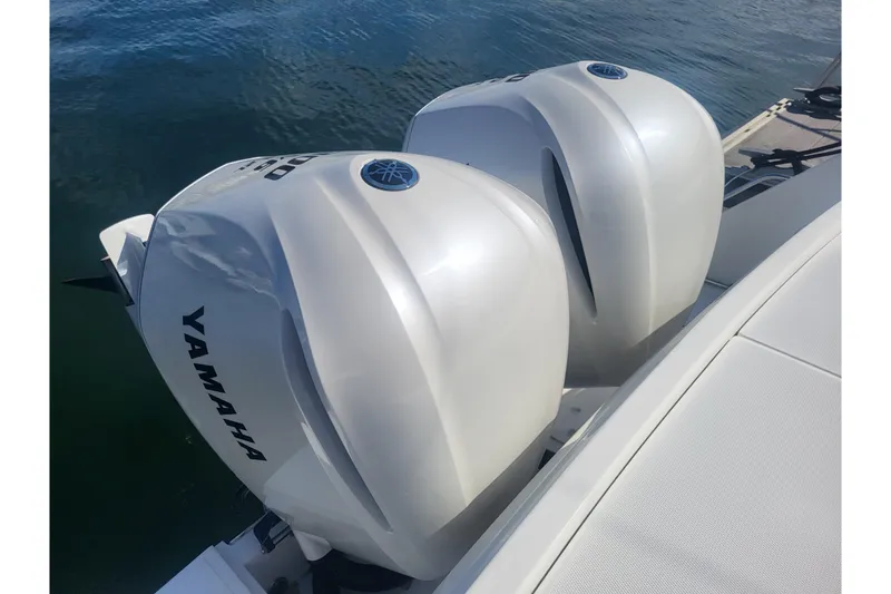 Slide: The Image of Twin Yamaha outboard engines on a 2005 Stamas 310 Tarpon boat. - 73