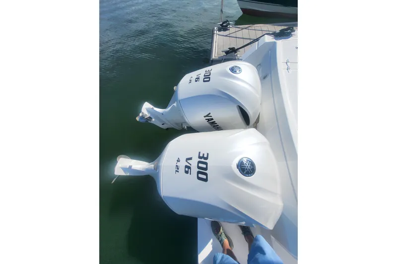 Slide: The Image of Twin Yamaha 300 V6 outboard engines on a 2005 Stamas 310 Tarpon boat. - 75
