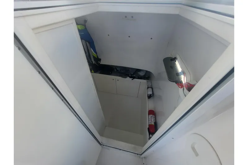 Slide: The Image of Interior cabin of 2005 Stamas 310 Tarpon boat with safety equipment. - 95