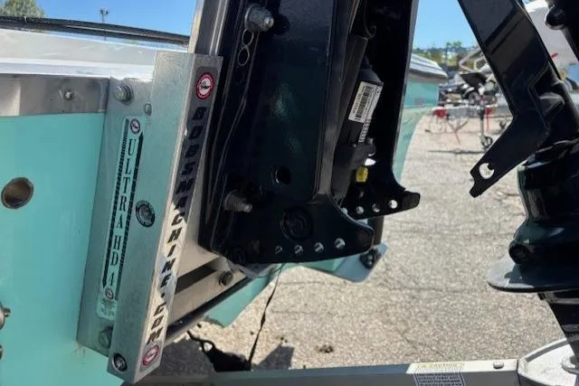 Slide: The Image of 2024 Mako 18 LTS boat engine mount detail in outdoor setting. - 5