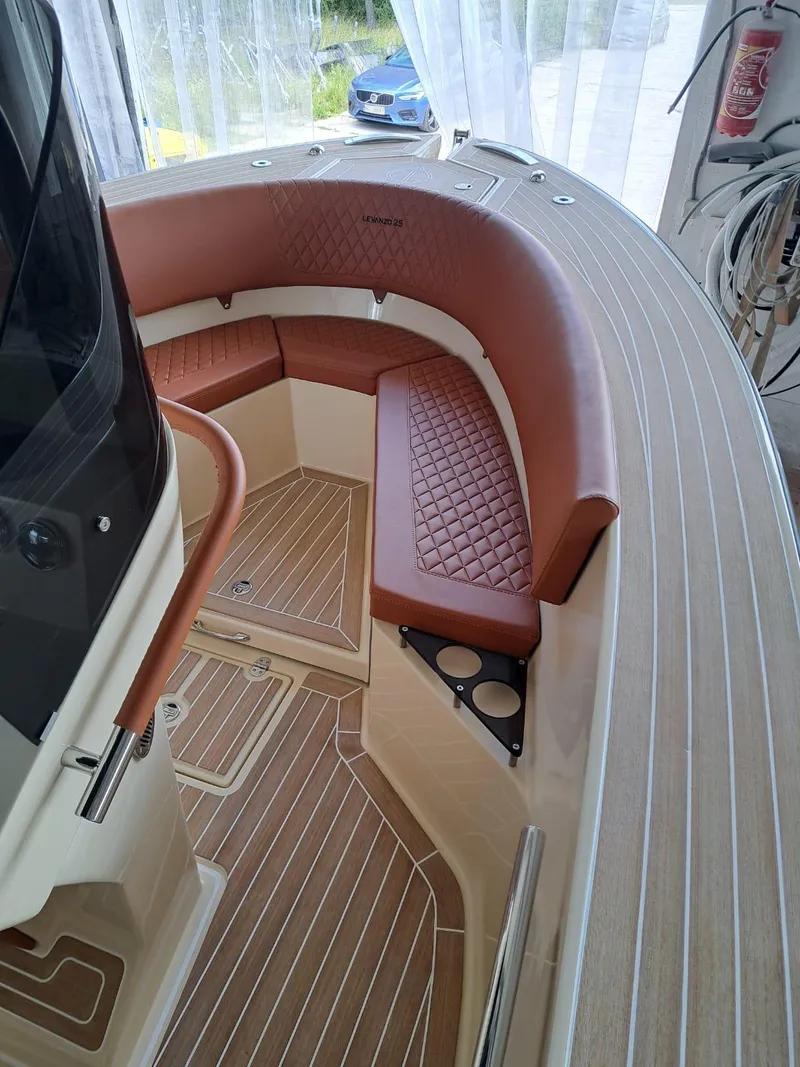 Slide: The Image of Luxurious interior of 2025 Lilybaeum Levanzo 25 Lounge Deck boat with elegant seating. - 13