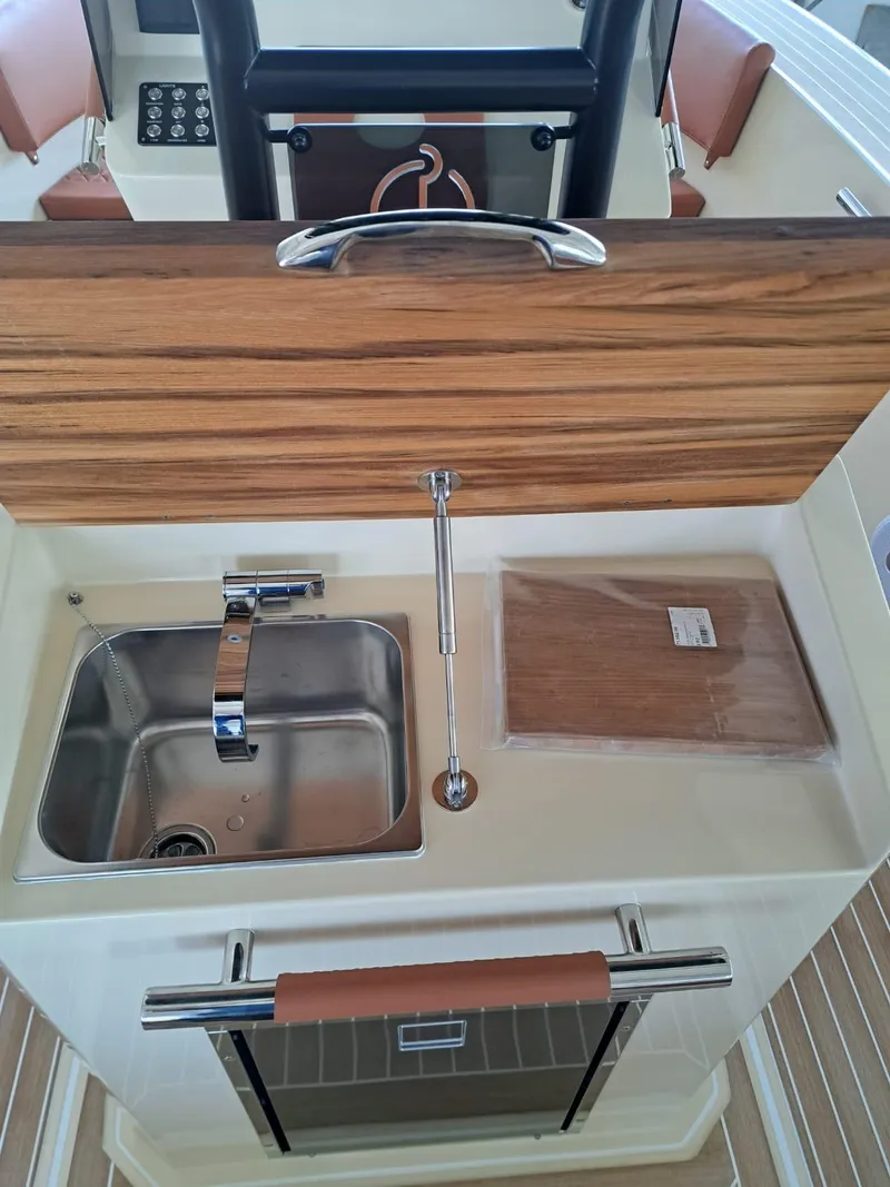 Slide: The Image of Modern kitchen area on 2025 Lilybaeum Levanzo 25 Lounge Deck boat. - 21