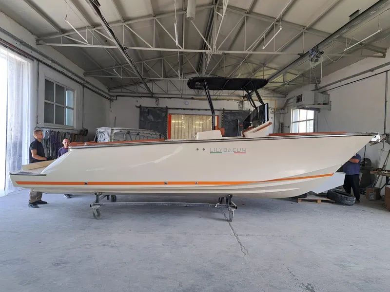 Slide: The Image of 2025 Lilybaeum Levanzo 25 Lounge Deck boat in a workshop setting. - 5