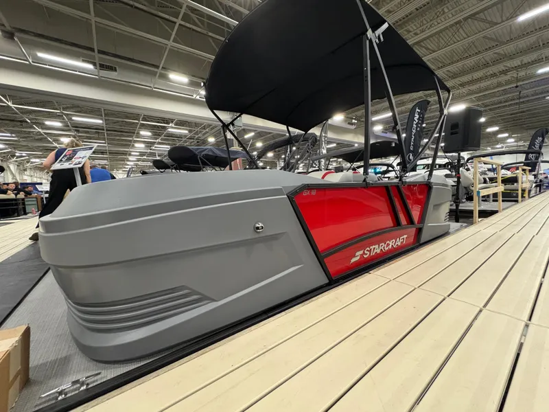 Slide: The Image of Starcraft GX 18 R 2026 boat displayed at a show. - 2