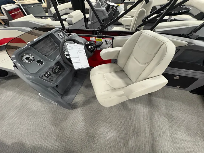 Slide: The Image of Interior of 2026 Starcraft GX 18 R with helm console and seat. - 8